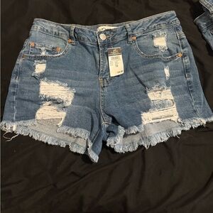 Ripped Jean shorts